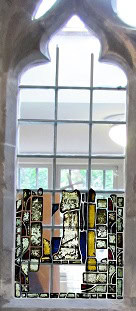 Just medieval parts of 1340 window in original window frame