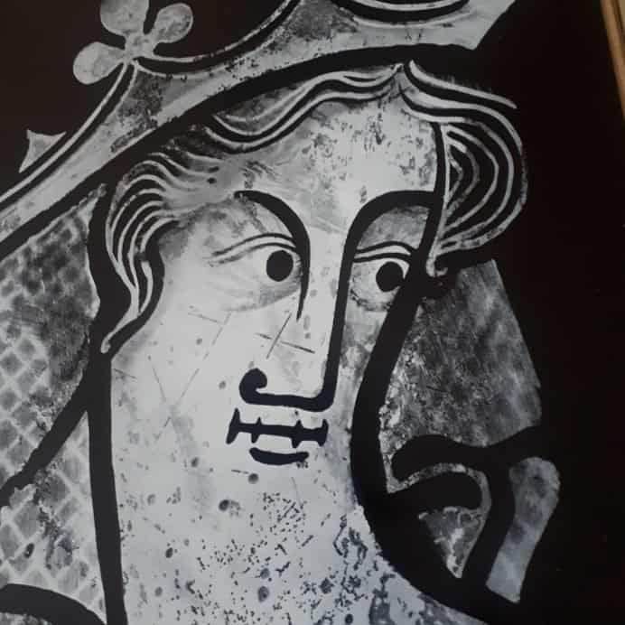 Women's face on a medieval window