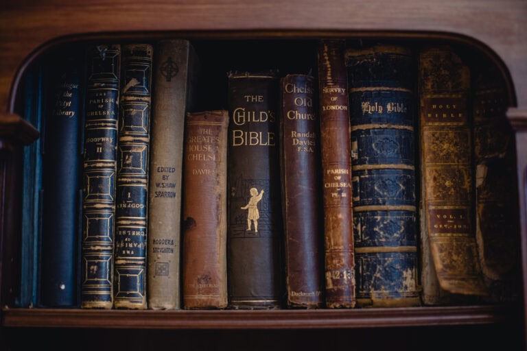Books on a bookcase inside Petyt Hall