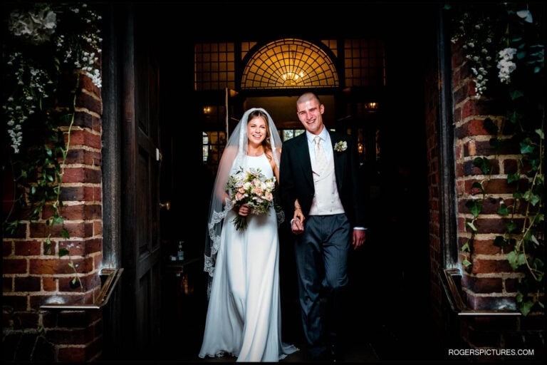 Saffie and Zac post-ceremony, leaving the church