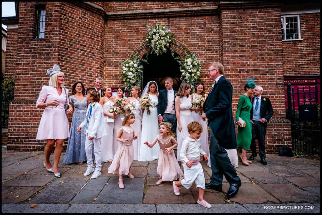 Saffie and Zac's wedding - family and friends outside the church
