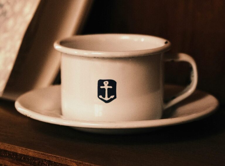 An anchor on a white cup