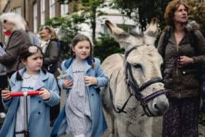 Two children with a donkey